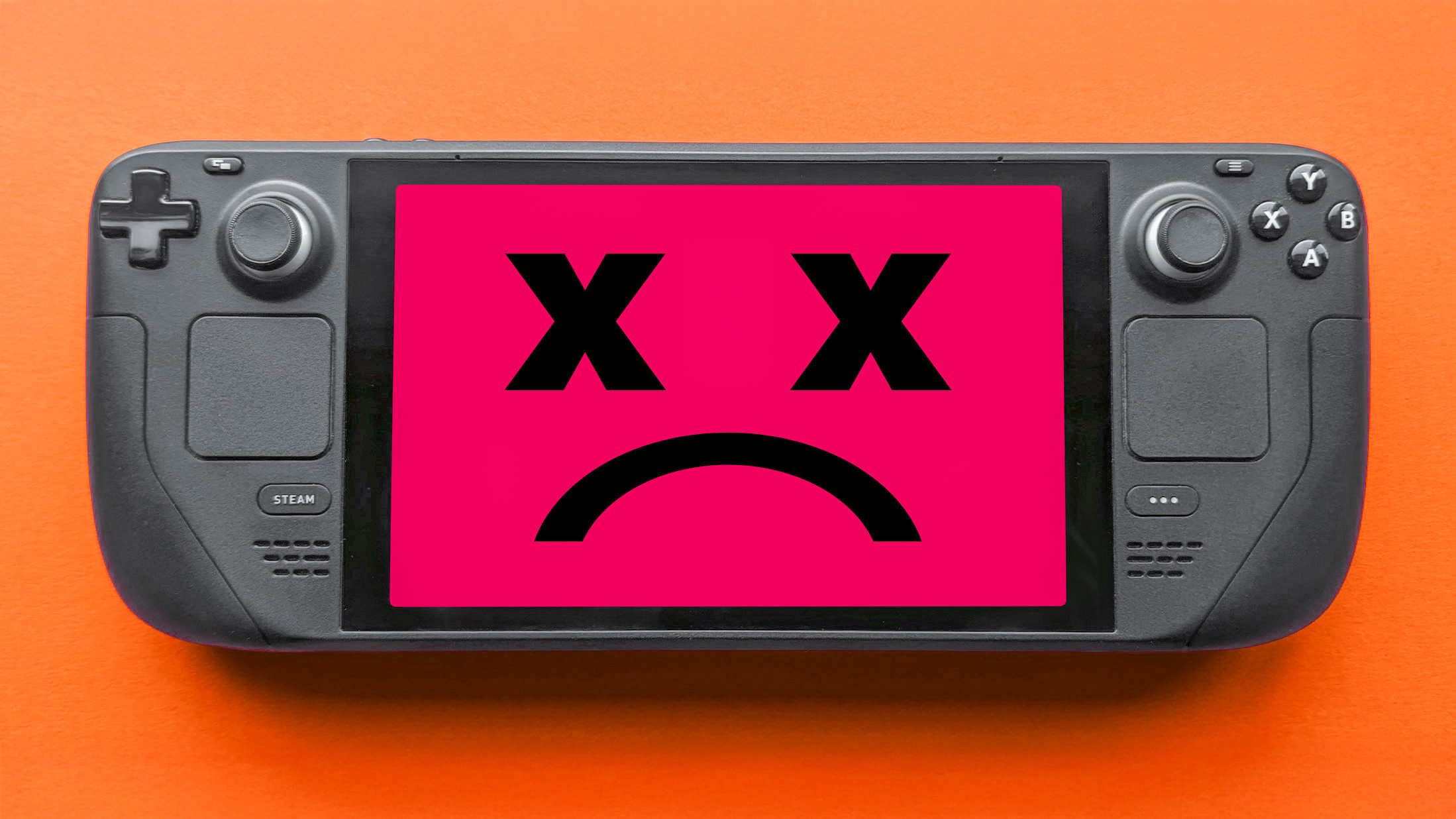 A Steam Deck displaying a red screen with two X-ed out eyes and a frown. 